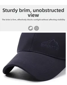 Macro detail of navy sports baseball cap with embroidered logo and curved reinforced brim