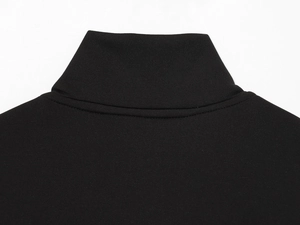 Detail of high stand collar and tight double-sided knit texture on black sweatshirt