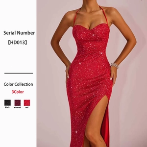 Elegant backless red sequin halter evening gown with a high slit and slim fit silhouette