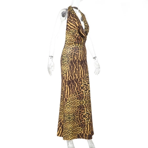 Detail of leopard print halter maxi dress with cowl neck and backless design on mannequin