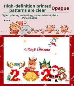 Detailed view of PVC Christmas decals with Santa, reindeer, and Merry Christmas text