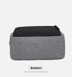 Detailed bottom view of the grey oxford fabric bag showing stitching and black zipper