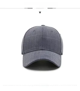 Front view of a grey baseball cap with fine white grid pattern and curved brim