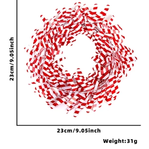 Detail of red and white candy cane wreath for Christmas party indoor decoration