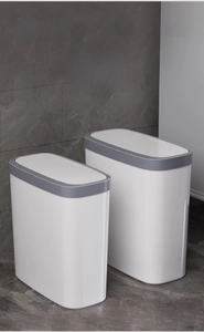 Dual pack of slim press-top trash cans in small and large sizes with white and gray finish