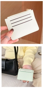 Detail of compact PU leather card holders in cream and mint green with zipper pockets