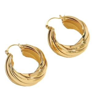 Minimalist glossy twisted hoop earrings in golden finish with unique metallic texture