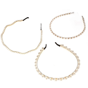Three-piece set of elegant white pearl headbands with golden metal frames for women