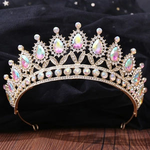 Detailed macro shot of luxury gold bridal crown with AB crystal water drop gems