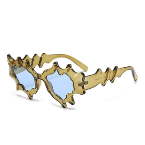 Irregular flame-shaped wavy sunglasses with brown frames and light blue lenses