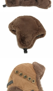 Dettaglio del cappello aviatore marrone in velluto con bottoni in metallo vintage