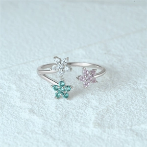 Close-up of S925 silver adjustable ring with colorful zircon flower petals and sleek finish