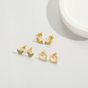Three-pair earring set featuring golden dolphin, green butterfly, and heart love studs