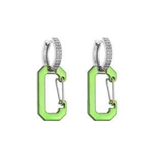 Detail of silver hoop earrings with micro-paved stones and bright green carabiner pendants