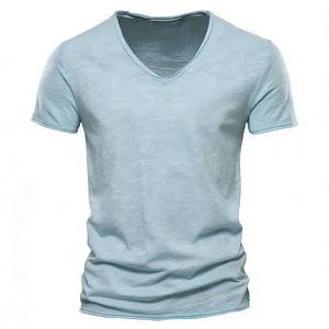 Detailed texture of light blue slub cotton fabric on a men's V-neck short sleeve T-shirt