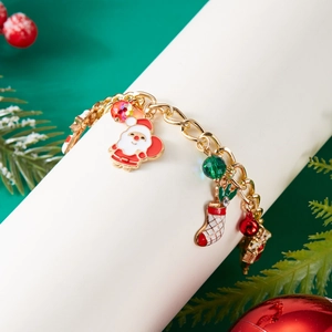 Detailed view of Christmas bracelet with Santa, stocking charms and festive beads
