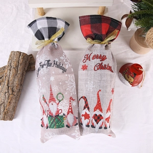 Christmas gnome wine bottle covers in checkered patterns with Merry Christmas holiday greetings