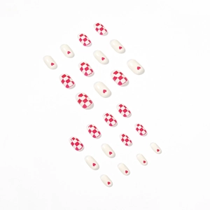 Creamy white and berry red checkered press-on nails with sweet heart patterns in oval shape