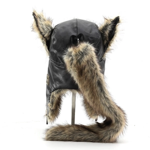 Faux leather winter trapper hat with furry ears and long tail attachment in black and brown