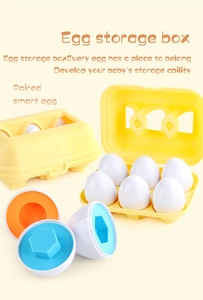 Detail of 6 color matching dinosaur eggs in a yellow storage box for toddler learning