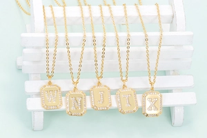 Gold plated 26 initial letter necklaces with sparkling cubic zirconia on fine chain