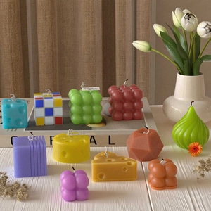Artistic bubble cube and geometric scented candles in assorted macaron pastel colors