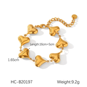 Detail of 18K gold-plated hollow heart bracelet with extender chain and logo tag
