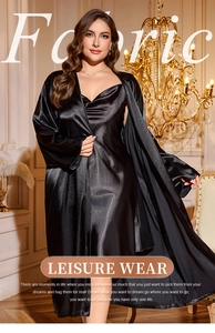 Detailed view of elegant black satin lounge wear set featuring silky robe and slip dress
