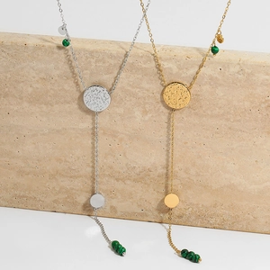 Bohemian Y-shaped long necklace in gold and silver with turquoise beads and round pendants