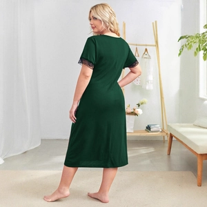Dark green V-neck midi dress with black lace short sleeves and waist tie back view