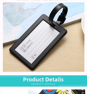 Detail of black PVC luggage tag featuring a clear ID window and adjustable strap