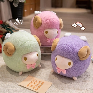 Set of three round plush sheep toys in pastel pink, mint green, and lilac with wings