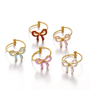 Colorful drip oil bow rings in gold stainless steel finish with adjustable open bands