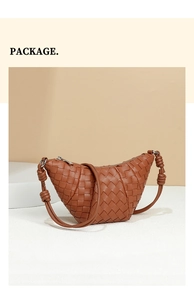 Detail of caramel braided leather shoulder bag with a unique knotted handle design