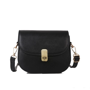 Classic black saddle crossbody bag with gold buckle and adjustable strap on white background
