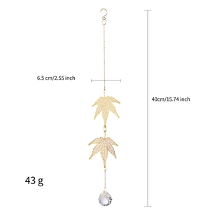 Detailed view of golden maple leaf crystal suncatcher showing 40cm length and 43g weight