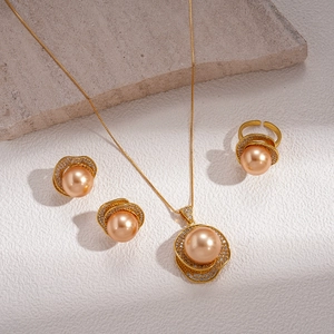 Vintage gold flower jewelry set with champagne pearls and sparkling crystals
