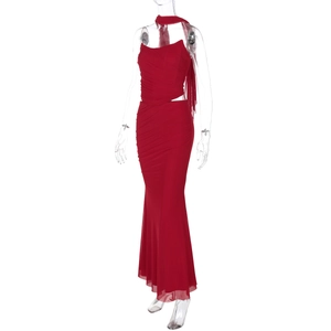 Detail of red mesh bodycon maxi dress with ruching, halter neck, and matching scarf