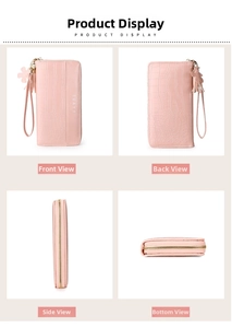 Detail of pink long zip wallet with crocodile texture and floral tassel accessory