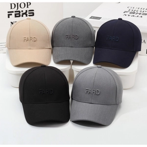 Detailed view of assorted baseball caps in five colors with FARD letter embroidery