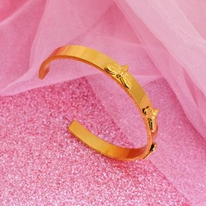 Bracelet jonc libellule minimaliste en acier titane avec placage or 18 carats rose