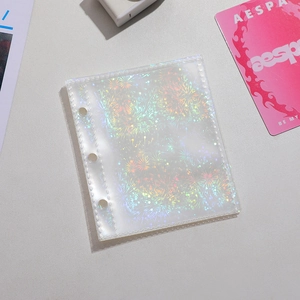 Close-up of holographic A8 binder sleeve with 3-hole punch design and sparkling laser finish