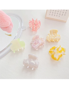 Set of 6 mini acetate hair claws in pastel colors with marble patterns and metal springs