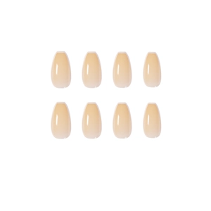 Glossy French ombre press-on nails in creamy white and nude pink coffin shape