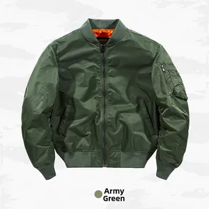 Detail of army green MA-1 bomber jacket with ribbed cuffs and bright orange lining