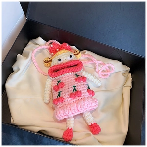 Pink hand-knitted girl doll bag with cherry dress and pearls in a premium black gift box