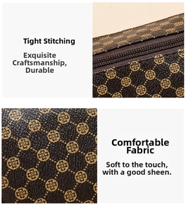 Detail of dark brown saddle bag featuring golden monogram pattern and smooth zipper