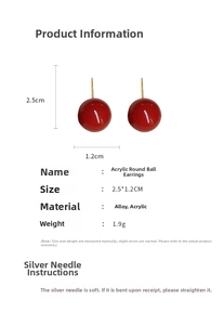 Detail view of red acrylic ball earrings with gold plated needles and size dimensions