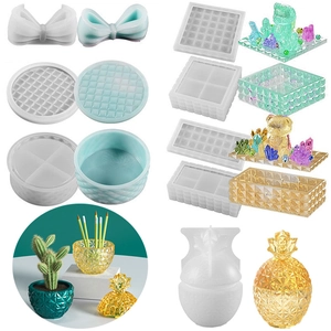 Macro view of pineapple-shaped and bow-knot jewelry storage jar silicone resin molds