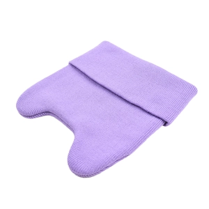 Detailed close-up of light purple knitted beanie featuring cute cat ears and folded cuff